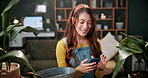Florist, scroll and woman with phone in house, laughing and plant research for sustainable business. Entrepreneur, indoor garden and person with mobile for online shop, typing and inventory on web