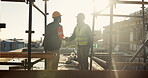 Construction, deal or people on site with handshake, intro or greeting in contractor partnership. Team, flare or engineers with shaking hands, agreement or opportunity for industrial collaboration.