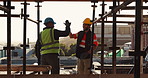 Construction, success or people on site with high five, team achievement or motivation in building project. Happy, men or engineer with scaffolding, victory or collaboration in industrial development