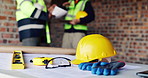 People, architecture and helmet on construction site for planning, PPE or building safety. Contractor, documents or paperwork with floor layout, tools or hard hat for civil engineering or security