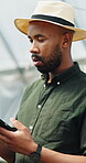 Greenhouse, farmer and man with tablet, agriculture and crop management on website or sustainability. Black person, online and monitor climate for plant growth, scroll and research with tech in farm