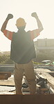 Construction, success or man on site with arms up, project finish or celebration in building progress. Back, flare or engineer with victory, deadline complete or achievement in industrial development