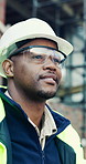 Hard hat, thinking and visor with black man on construction site for engineering or property development. Architecture, goggles and helmet with industrial worker outdoor for inspiration or planning
