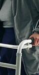 Injury, hands and healthcare with old woman and walker for rehabilitation, support and osteoarthritis. Medical, walking and retirement with closeup of senior person with a disability in nursing home