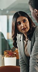 Creative, women and discussion in office with meeting, proposal and manager advice for advertising. People, talk and teamwork in business with marketing management, planning and project collaboration