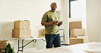 Moving, thinking and man with tablet in new house, interior decorating inspiration and box inventory. Smile, planning or black person with tech for online shopping, furniture order or renovation idea