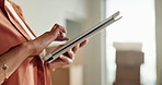 Scrolling, tablet and hands of woman in new house for online shopping, purchase or ecommerce. Digital technology, website and female person with furniture order on app for renovation in apartment.