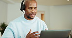 Headset, talking and black man with laptop in home for call center, help desk or remote work. Freelancer, mic and male technical support consultant with contact us or customer service in house.