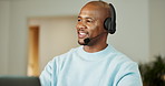 Mic, talking and black man in home for call center, communication or help desk with remote work. Freelancer, headset and male technical support consultant with contact us or customer service in house