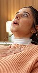 Stress, tapping and eft with woman in home for eft technique, calm and self regulation. Acupressure, mental health and breathing with person with anxiety in living room of apartment for peace