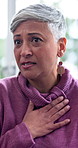 Mental health, sad or woman in agency with group therapy, anxiety trigger or memory of trauma. Grief, employee or mature person with depression, worry or emotional fatigue in counseling session.