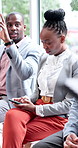 Waiting, job interview and business people with raised hand in office for attendance with recruitment. Meeting, phone and candidates in queue for hiring process or employment opportunity in workplace