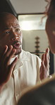 Upset, argument and couple in home with conflict, breakup or toxic relationship with infidelity. Angry, drama and people fighting for blame on cheating, affair or problem with divorce in house 