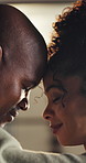 Forehead, love and black couple in home, support for healing and bonding together for care. Apartment, happy man and woman in living room, embrace and trust for romance, marriage and relationship