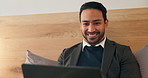 Businessman, typing and bedroom with laptop in hotel for remote work, schedule or communication. Happy man, freelancer or smile with computer in bed for online network or connection in apartment