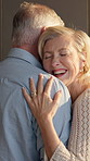 Dancing, laugh and senior couple in kitchen for bonding, relationship and connection in home. Marriage, happy and elderly man and woman with music, movement and embrace for affection, trust and love