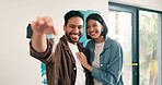 Real estate, face or Asian couple in home with keys, safety access and investment in dream house. Purchase, love or happy people with security, property success or moving achievement for homeowners.