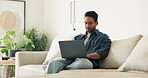 Man, relax and reading in home with laptop, research and finance report for mortgage. Smile, male person and pc at house for budget review, online payment and financial audit for household expenses