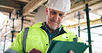 Mature, architect and happy man with tablet on construction site for scaffolding safety or security. Male person, contractor or civil engineer with technology for building or architecture development