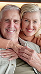 Face, old couple and hug in home with smile, soulmate connection or bonding together for retirement. Happy, married senior people and embrace on sofa with love, wellness or affection for relationship