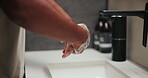 Basin, washing hands and soap with person in bathroom for grooming, hygiene or skincare routine. Cleaning, foam and wellness with man at sink in home to remove bacteria or germs for disinfection