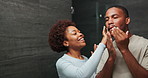 Cream, mirror and black couple in home bathroom with bonding, self care and together for skincare. Happy man, woman and reflection in house with dermatology, grooming and hygiene with lotion for glow