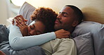 Couple, sleeping and holding hands on bed, home and bonding with partner in bedroom, support or love. Black people, care and resting with spouse in house, affection and commitment for relationship