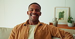Face, laugh and black man in living room with humor, positive attitude and relax on weekend break. Happy, African person and chill in home with optimism, funny thought and stress free for wellness.