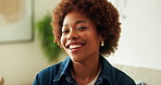 Face, laugh and black woman in home for relax, chill and wellness on weekend break at apartment. Portrait, living room and funny person at house with happiness, humor and staycation with comfort