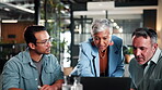Creative, team and meeting with laptop in office, brainstorming and digital marketing with research. Business people, online and collaboration for brand awareness, discussion and ideas on website