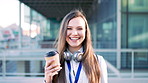 Face, woman and coffee in city with realtor, headphones and commute for outdoor development. Happy, person or real estate agent with drink for portrait, confidence or travel for property management
