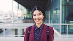 Face, asian woman and business in city with confidence, travel and happy for accounting. Smile, female person or financial advisor in town for consultant, portrait or commute with asset management