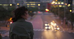 Back, night and thinking with woman in city for sightseeing, travel or vacation abroad. Bokeh, smile and view of traffic with happy tourist on bridge in overseas town for exploration or discovery