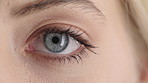 Woman, optometry and blue eye with vision for awareness, eyesight or nerve for optic senses. Closeup, female person or eyelashes with iris, pupil or gaze for perception, observation or detection