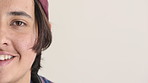Half, face and man in studio, hair care and texture with dermatology on white background. Happiness, space and person with wellness, healthy scalp and smile with volume,  maintenance and keratin