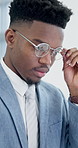 Glasses, business and black man on laptop for finance review, investment proposal and research. Corporate, typing and person on computer for financial report, budget planning and strategy in office