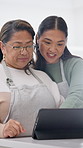 Cooking, senior mother and women with tablet, scroll and searching for recipe on website in kitchen. Online, mature person and talking to daughter with tech, happy and learn culinary skills in house