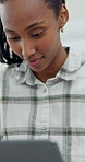 Woman, reading and remote work in home with laptop, check email response or daily HR administration. Human resources contractor, black person and morning in house with computer, browsing or planning.