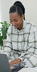 Laptop, typing and black woman in bed with remote work, email response and daily online administration. Freelancer, person and morning in home with computer, project review and company communication.