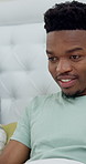 Relax, smile and streaming with black man in bed at apartment for browsing, chilling or search. Break, comfortable and subscription with happy person in bedroom of home for online connection