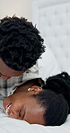 Black couple, bed and pillow fight in playful morning, wake up or bonding together in home. Happy man, woman and smile for weekend, holiday or break with cushion game and humor or excited in bedroom