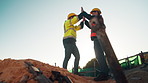 Men, team or high five on construction site for achievement, building development or space. Low angle, engineers or outdoor with cheering for inspection approval, renovation progress or collaboration