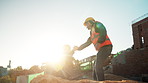 Men, team or holding hands on construction site for help, building development or space. Support, engineers or outdoor with assistance for safety requirements, renovation or collaboration with flare
