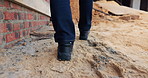 Construction, walking and legs of person for site inspection, building evaluation and compliance. Architecture, engineering and back of worker for renovation project, remodeling and infrastructure