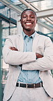 Face, businessman and smile in city with arms crossed, private equity job and pride for finance career. Happy, black person and confident in urban town with employment, risk capital work or about us.