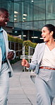 Excited, dancing and business people in city for winning, energy or outdoor celebration. Happy, businessman or woman with smile, high five or vibe for team achievement, success or good news in town