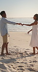 Holiday, dance and couple with smile on beach for bonding, summer travel and romance for connection. Support, happy and black people with tropical vacation for love, trust and moving together by sea