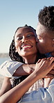 Couple, hug and happy on holiday, kiss and travel with partner for anniversary celebration and date. Outdoor, black people and embrace with spouse on special event, bonding and support on vacation