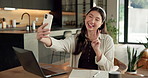 Woman, remote work and selfie in home, peace sign and social media post for content creation. Smile, photo and Asian person at house with picture, v gesture or freelance influencer with status update