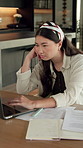 Bored, student and woman in home with laptop, elearning and fatigue from studying for college exam. Tired, Asian person and online education in house with computer, boring university task or project.